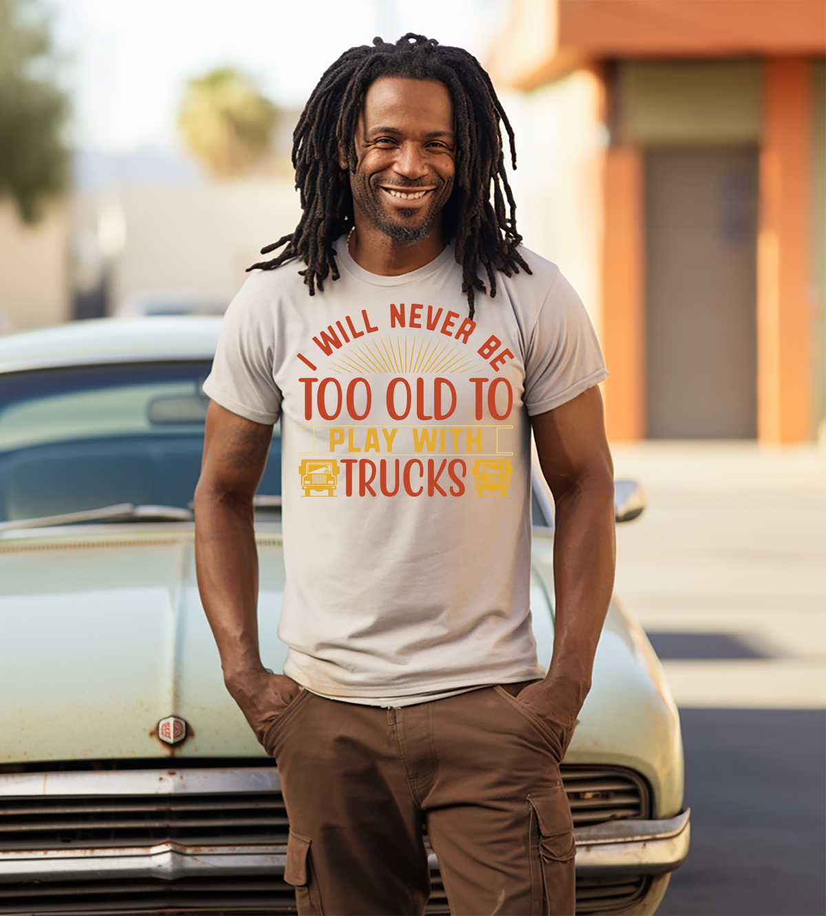 I Will Never Be Too Old to Play With Trucks – Funny Trucker Graphic Shirt